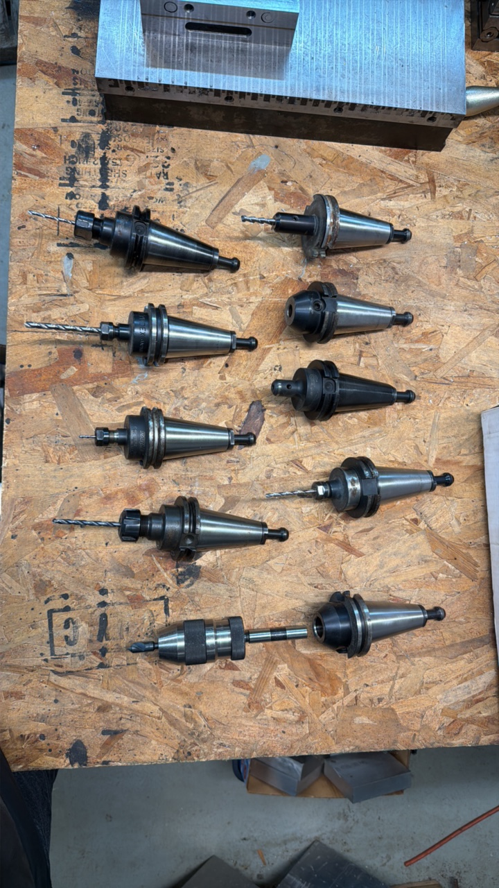 lot 75 image: (9) ASSORTED Cat-style taper tool holders