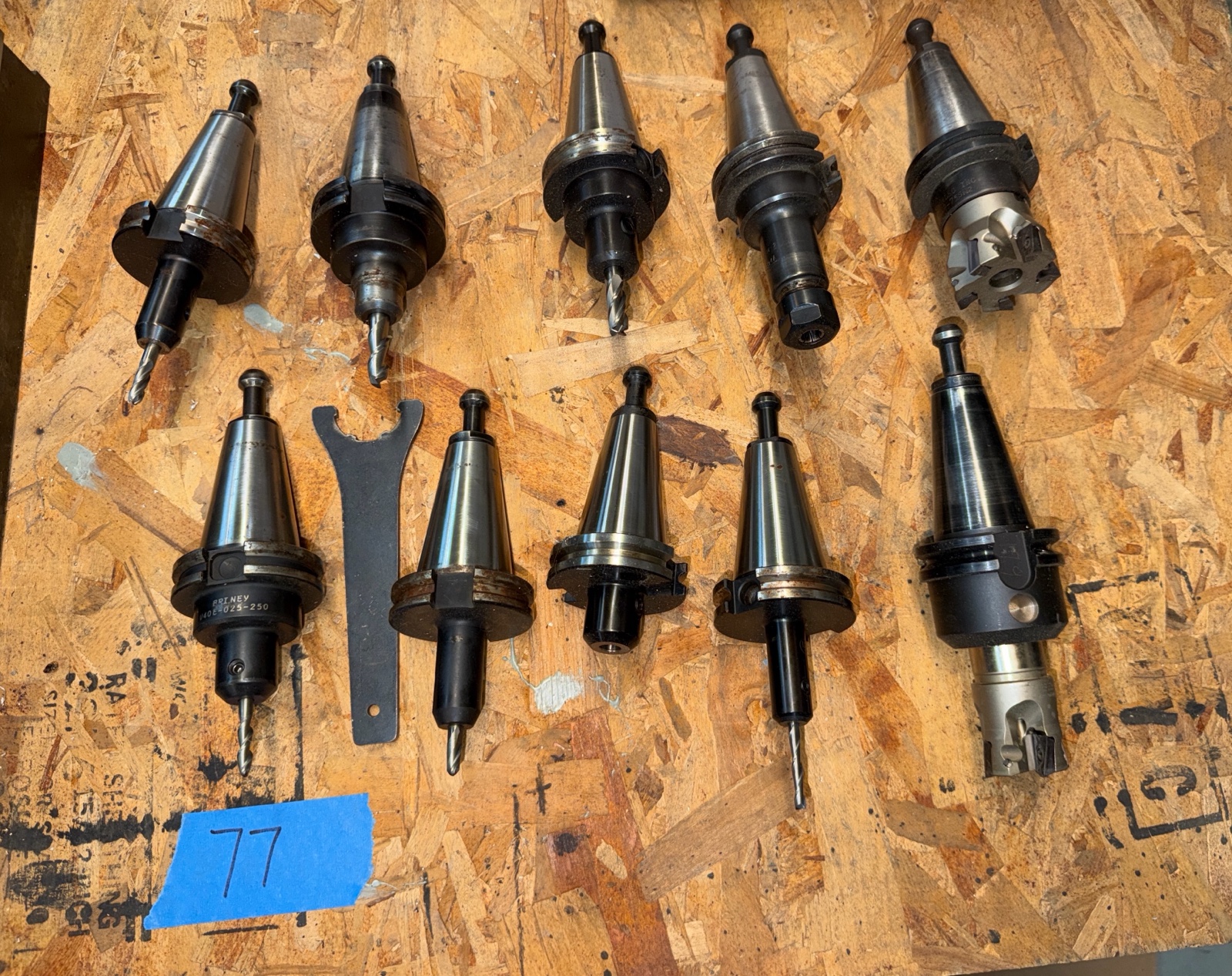 lot 77 image: (10) CNC CV40 assorted tool holders with cutters & drills for milling