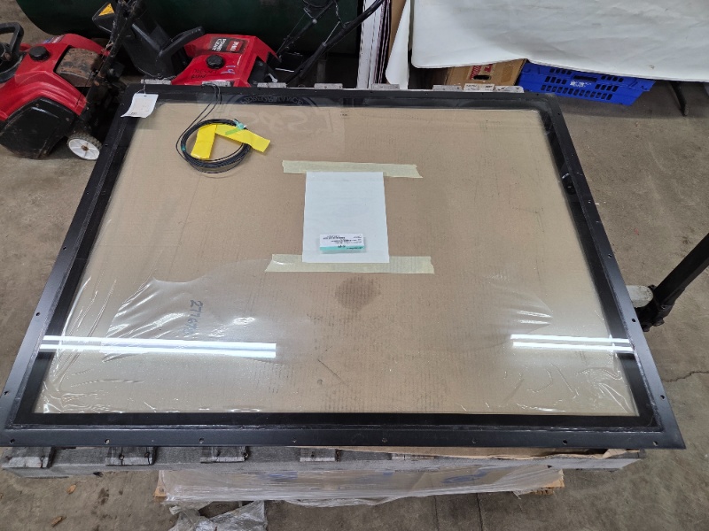 lot 17 image: LORAM W1 Front Center Heated Safety Glass Window Panel 51x44 in