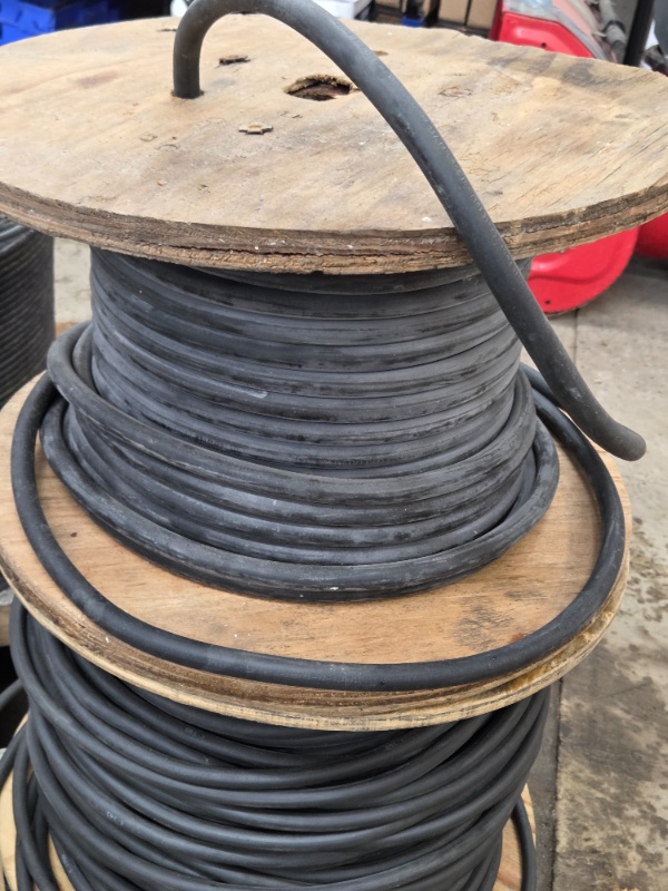 lot 26 image: Industrial Spool of 4 AWG THW Electrical Cable