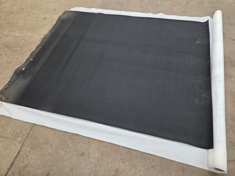 lot 64 image: Rubber Roll Sheet 5 x 5 appx