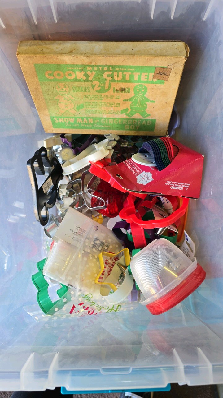 lot 120 image: Small Tote of Baking Items, cookie Press, Cookie Cutters, Rosette Maker,  Tips for Decorating