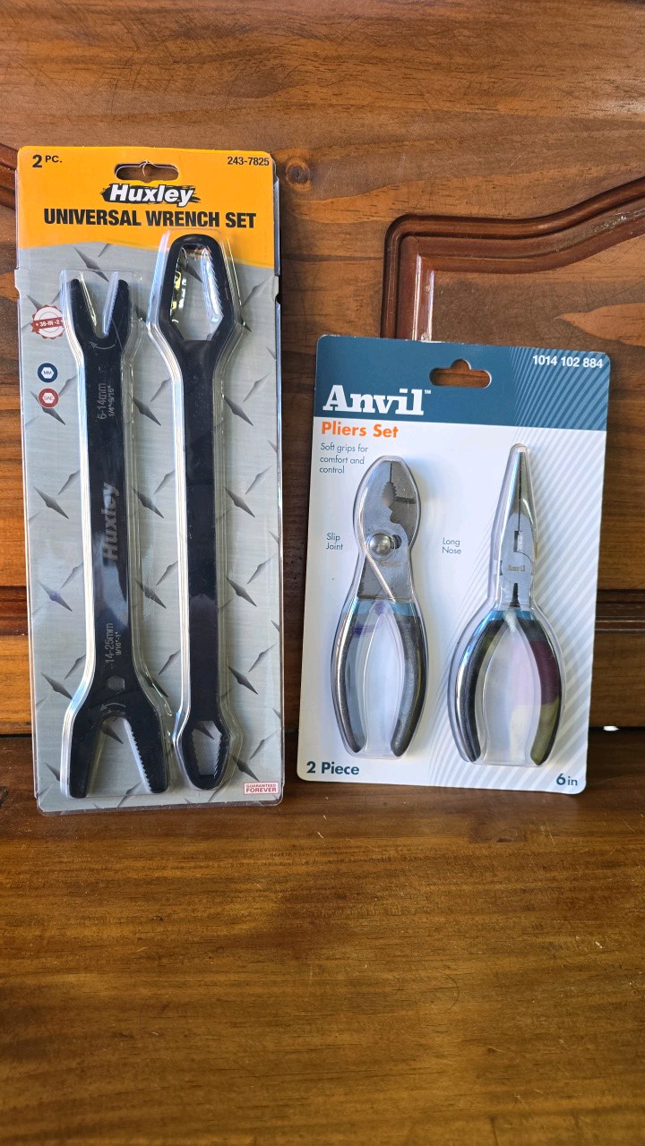 lot 28 image: NEW Huxley Universal Wrench Set & Anvil Pliers Set