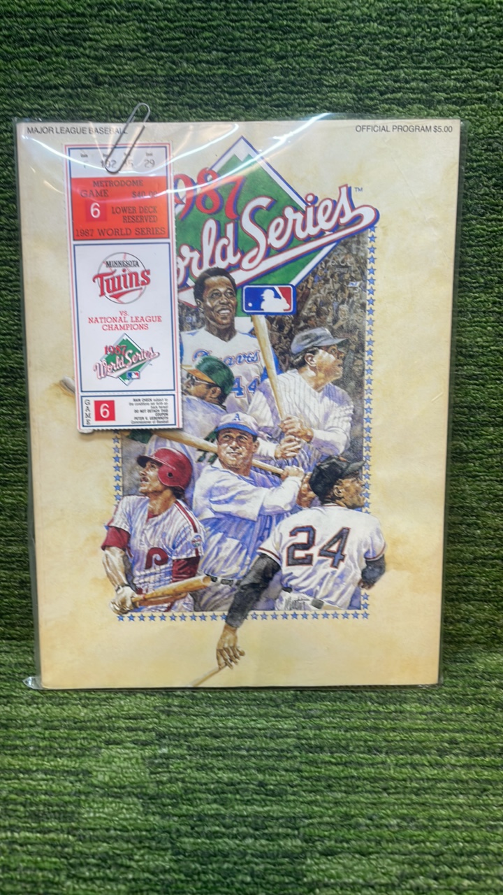 lot 62 image: 1987 Minnesota Twins, World Series OFFICIAL Program with Game Six Ticket