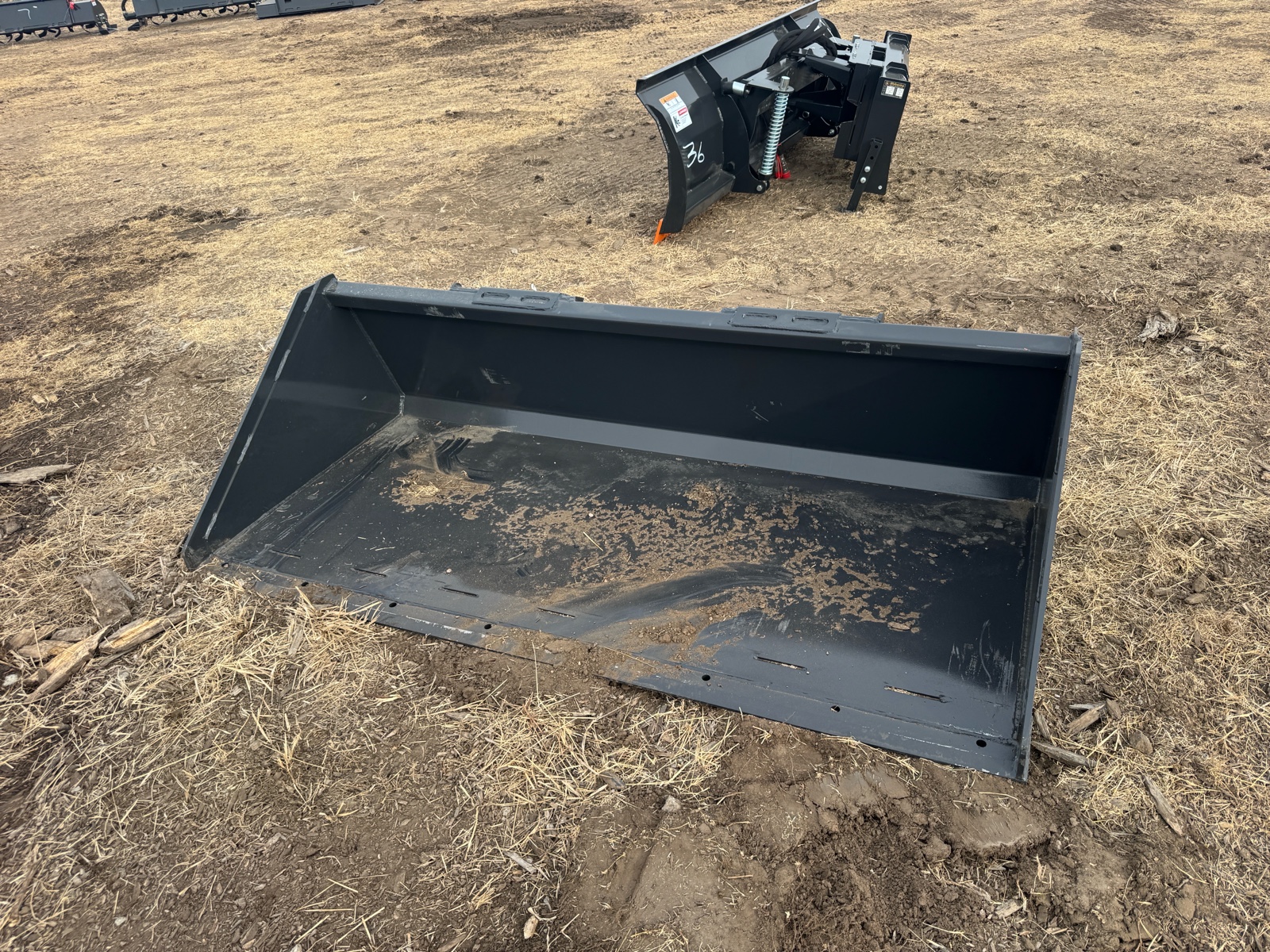 lot 53 image: Track Duty Bucket WOLVERINE 2026 Unused LPB-11-72W