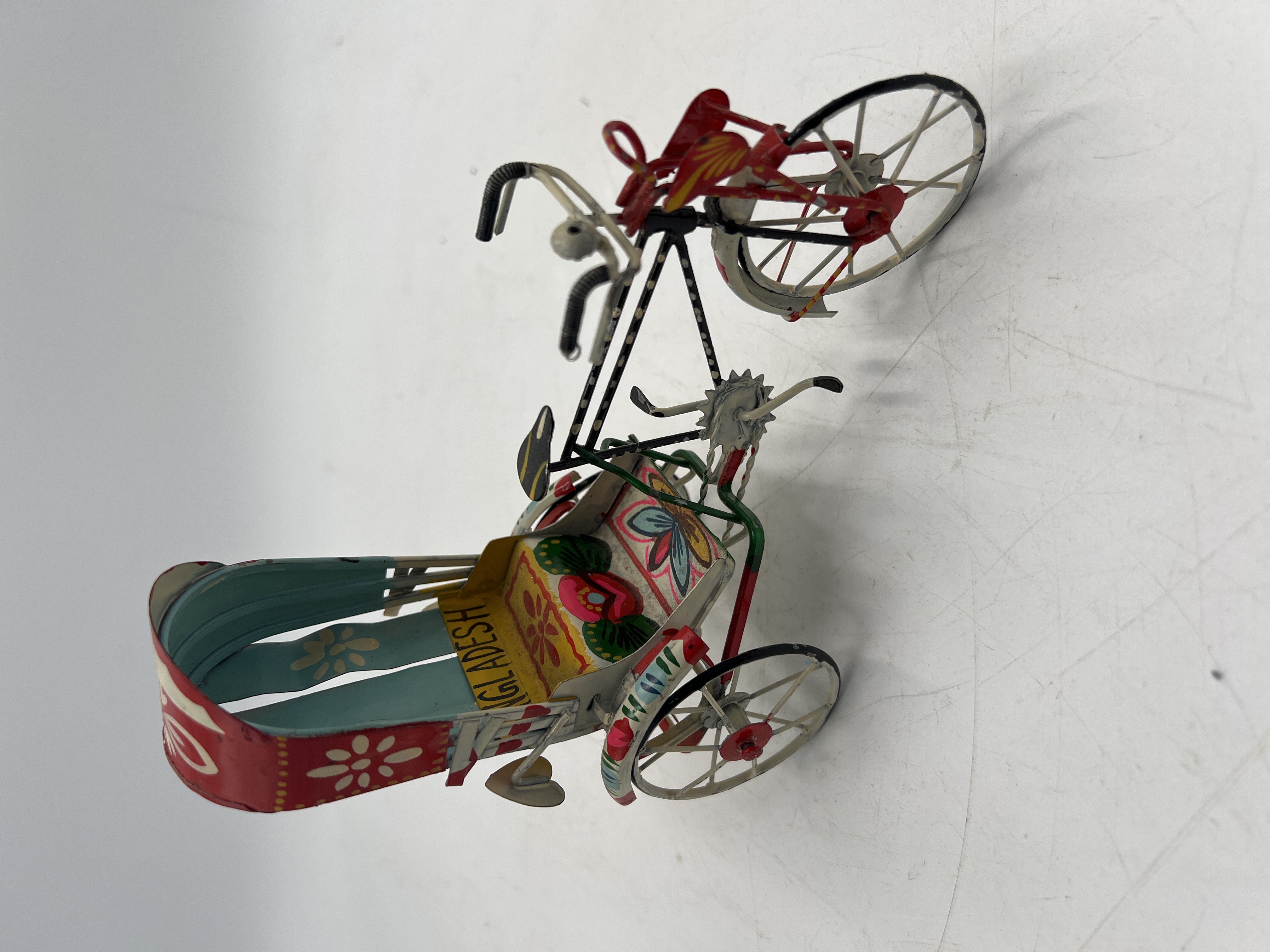 lot 28 image: Miniature Rickshaw