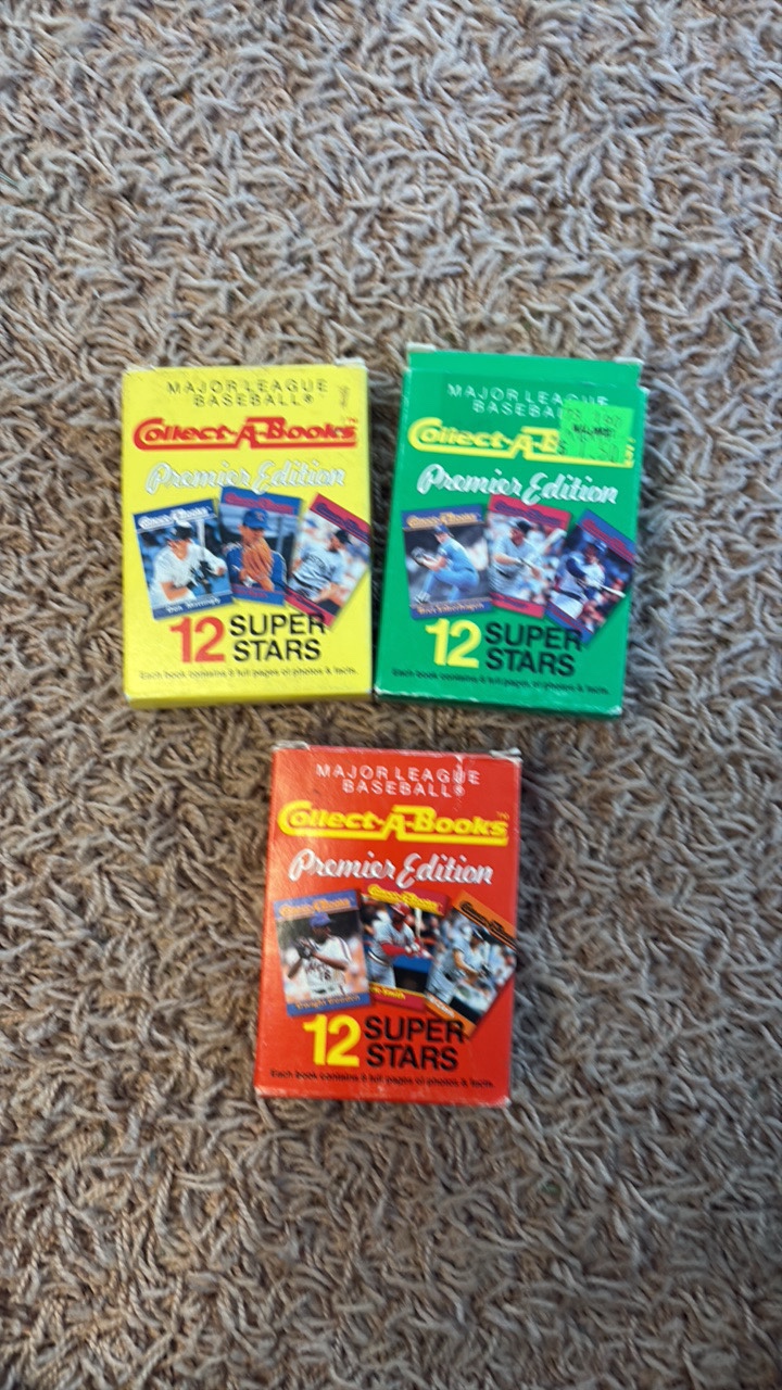 Three Boxes of Collect a Books Booklet Cards Featuring Baseball Legends