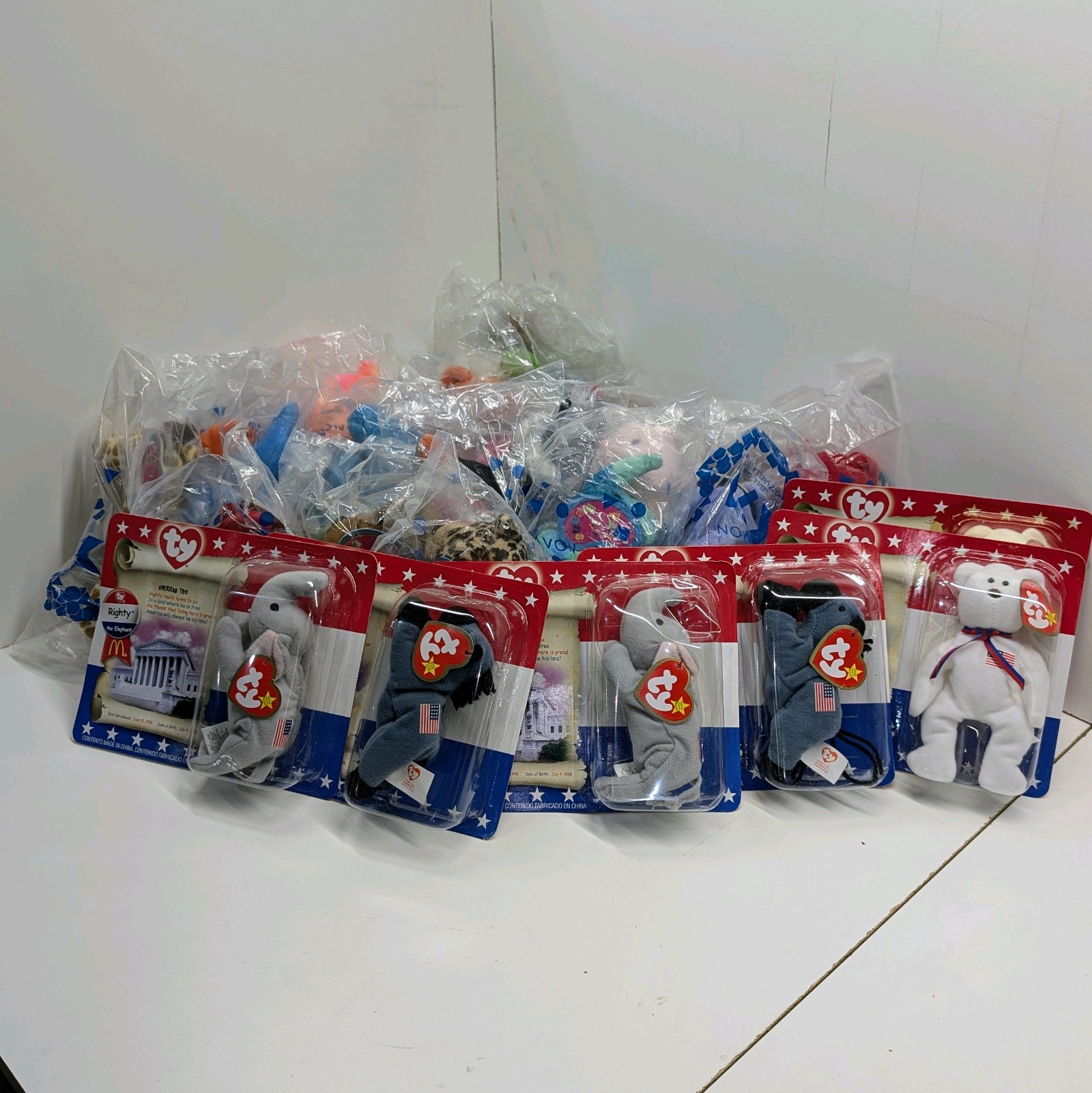 lot 49 image: Lot Of McDonalds Ty, Avon, Disney, Barbie, Hot Wheels Plush Toys