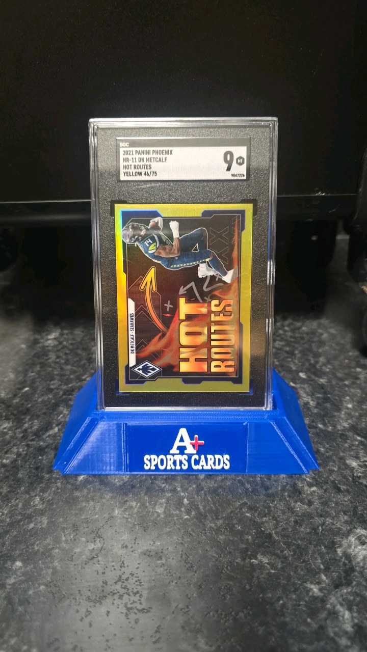 lot 52 image: 2021 Panini Phoenix Hr- Dk Metcalf Hot Routes Yellow 4675 SGC 9