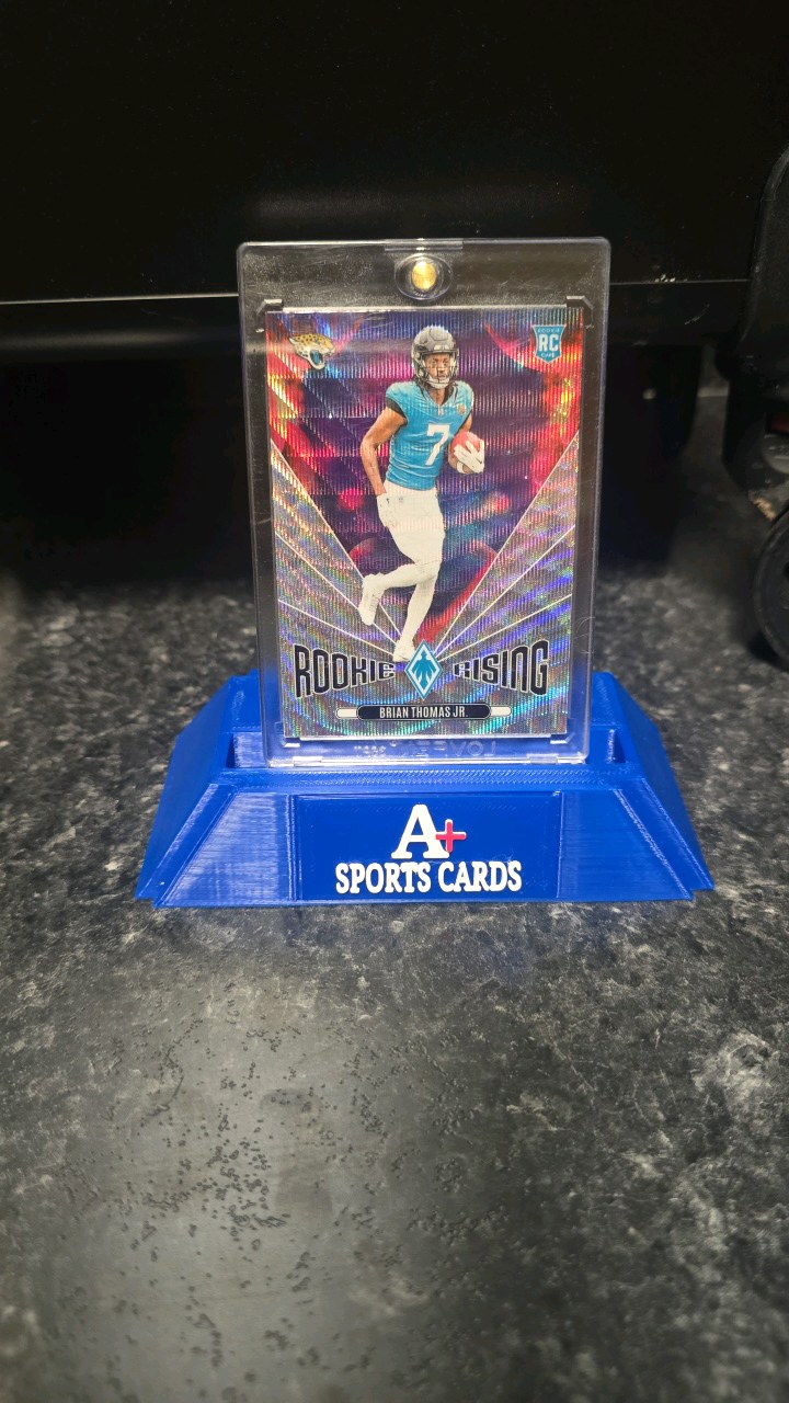 lot 54 image: 2025 Panini  Phoenix Rookie Rising Brian Thomas Jr.