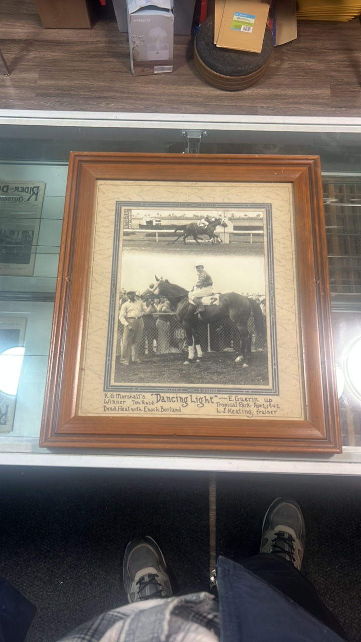 lot 66 image: 1942 dancing light horse racing photograph