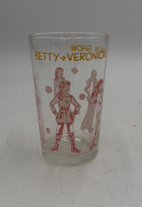 lot 112 image: Vintage Archie Comics Betty & Veronica Glass Tumbler  1970s Promotional