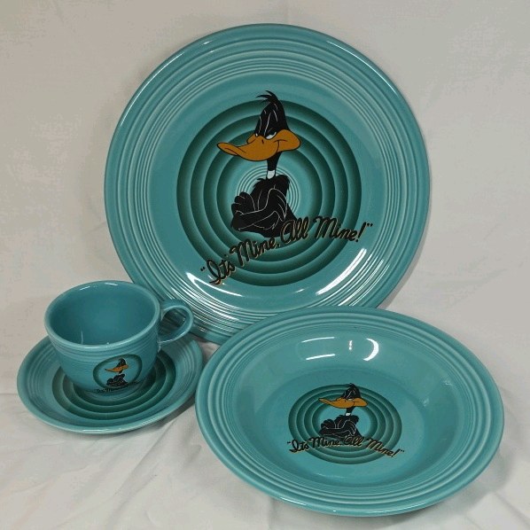 lot 136 image: Vintage 1994 Fiesta Looney Tunes Daffy Duck Its Mine, All Mine Teal Set