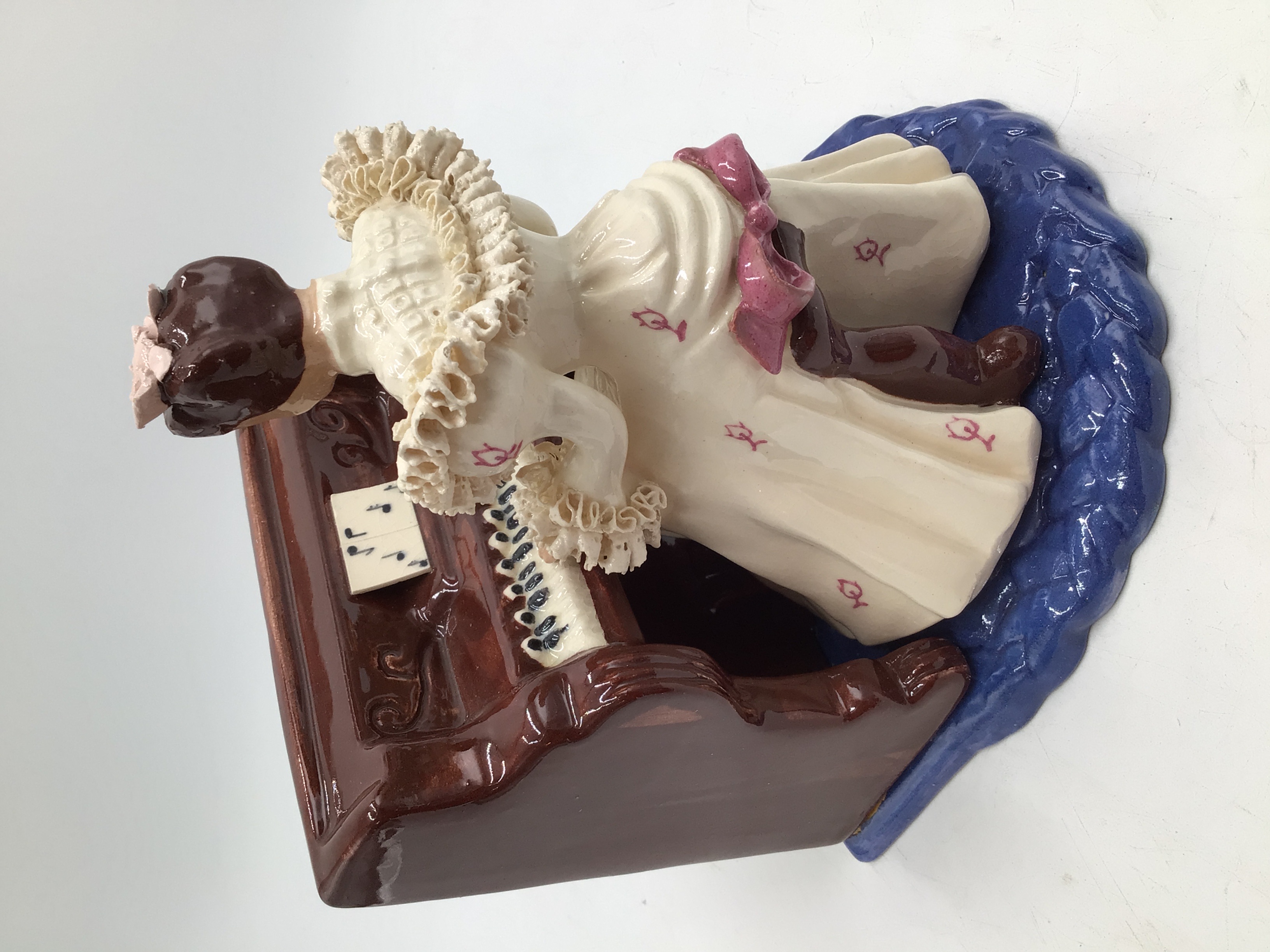 lot 16 image: Vintage Porcelain Figurine Lady Playing Piano