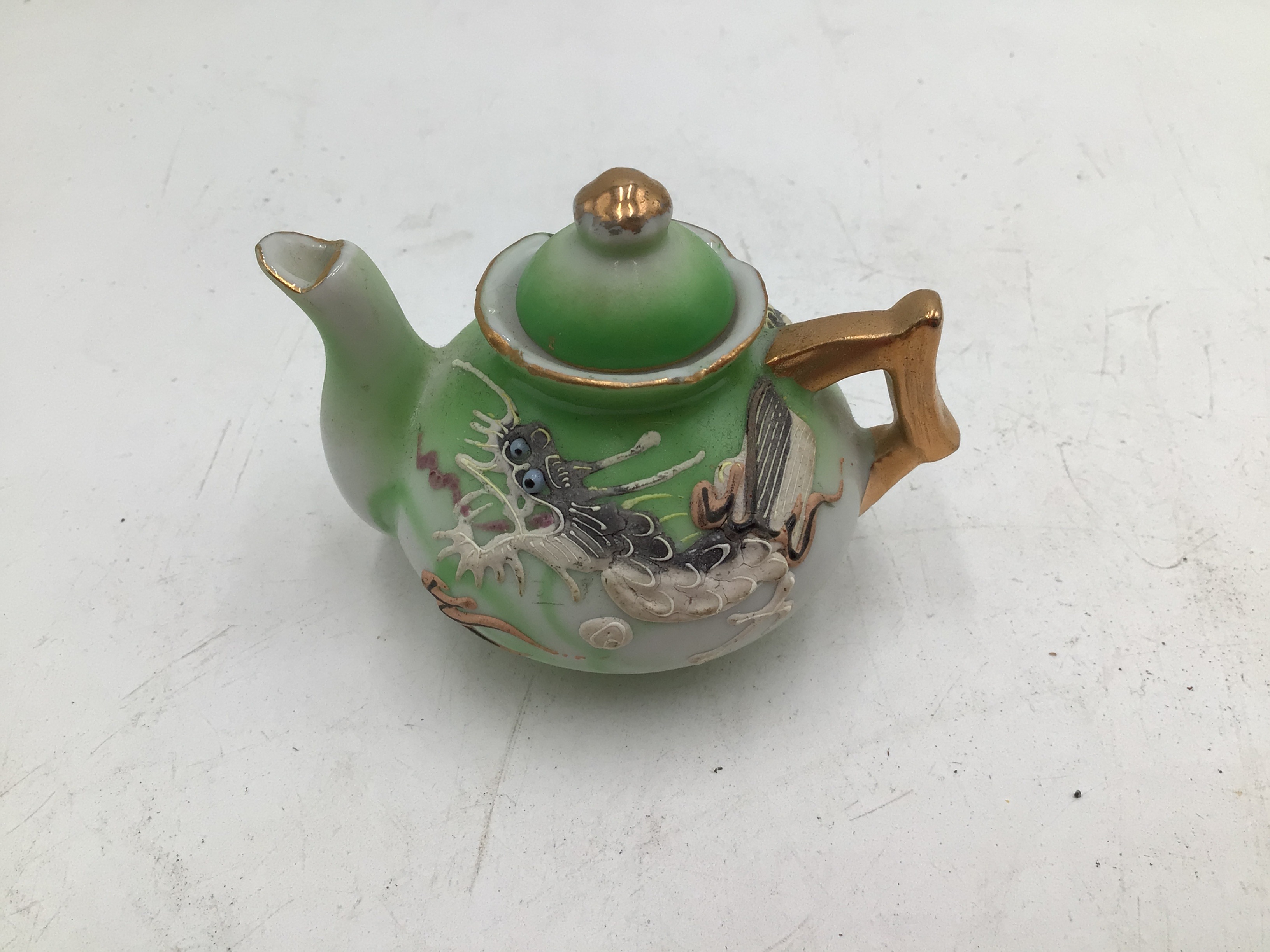 lot 169 image: Vintage Japanese Miniature Teapot with Dragon Design