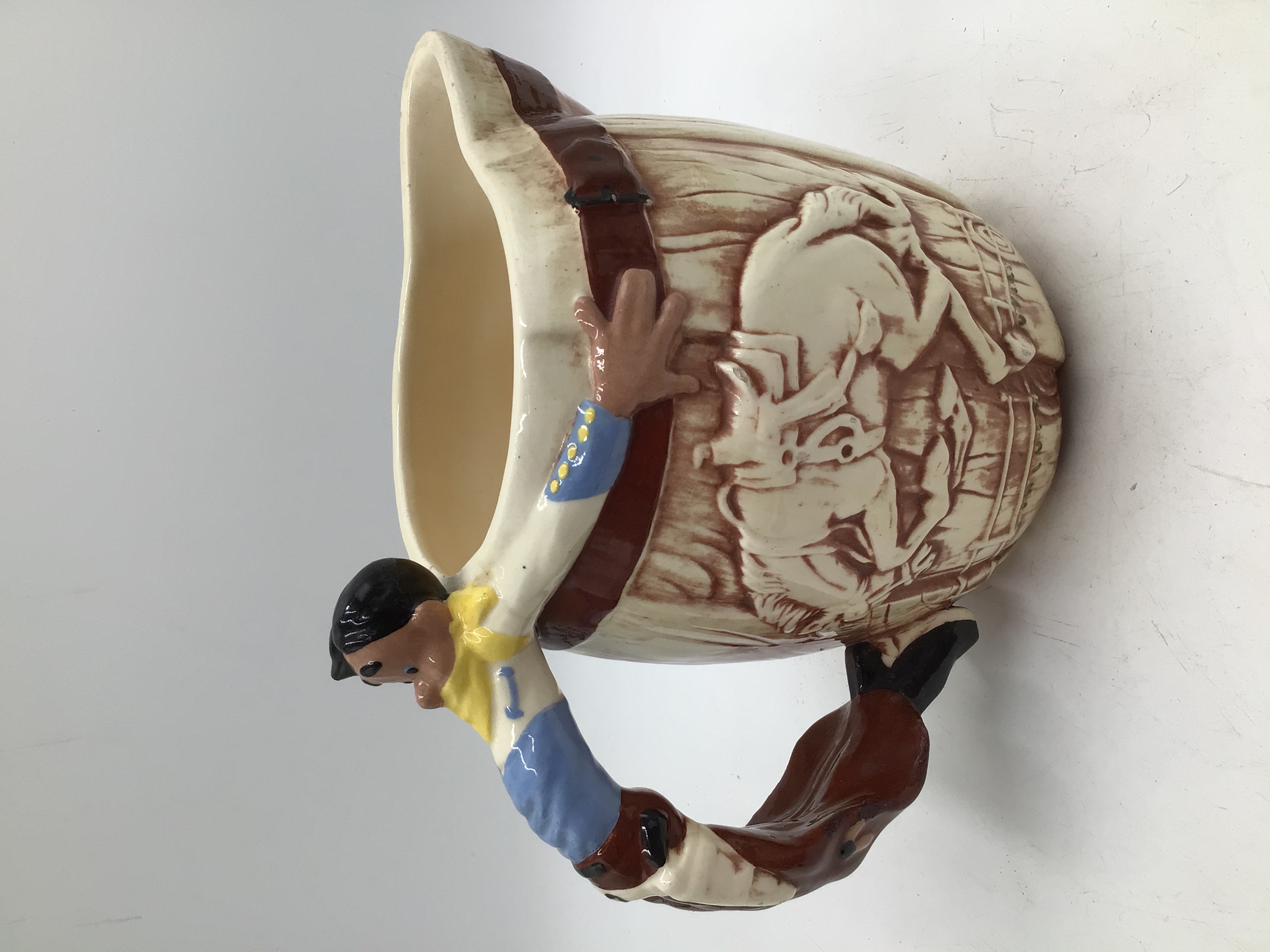 lot 190 image: Vintage Cowboy Themed Ceramic Pitcher Bronco Rider Handle Western Barrel Design