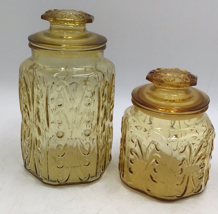 lot 213 image: Pair of Vintage Amber Depression Glass Canisters Octagonal Faceted Floral Embossed with Lids