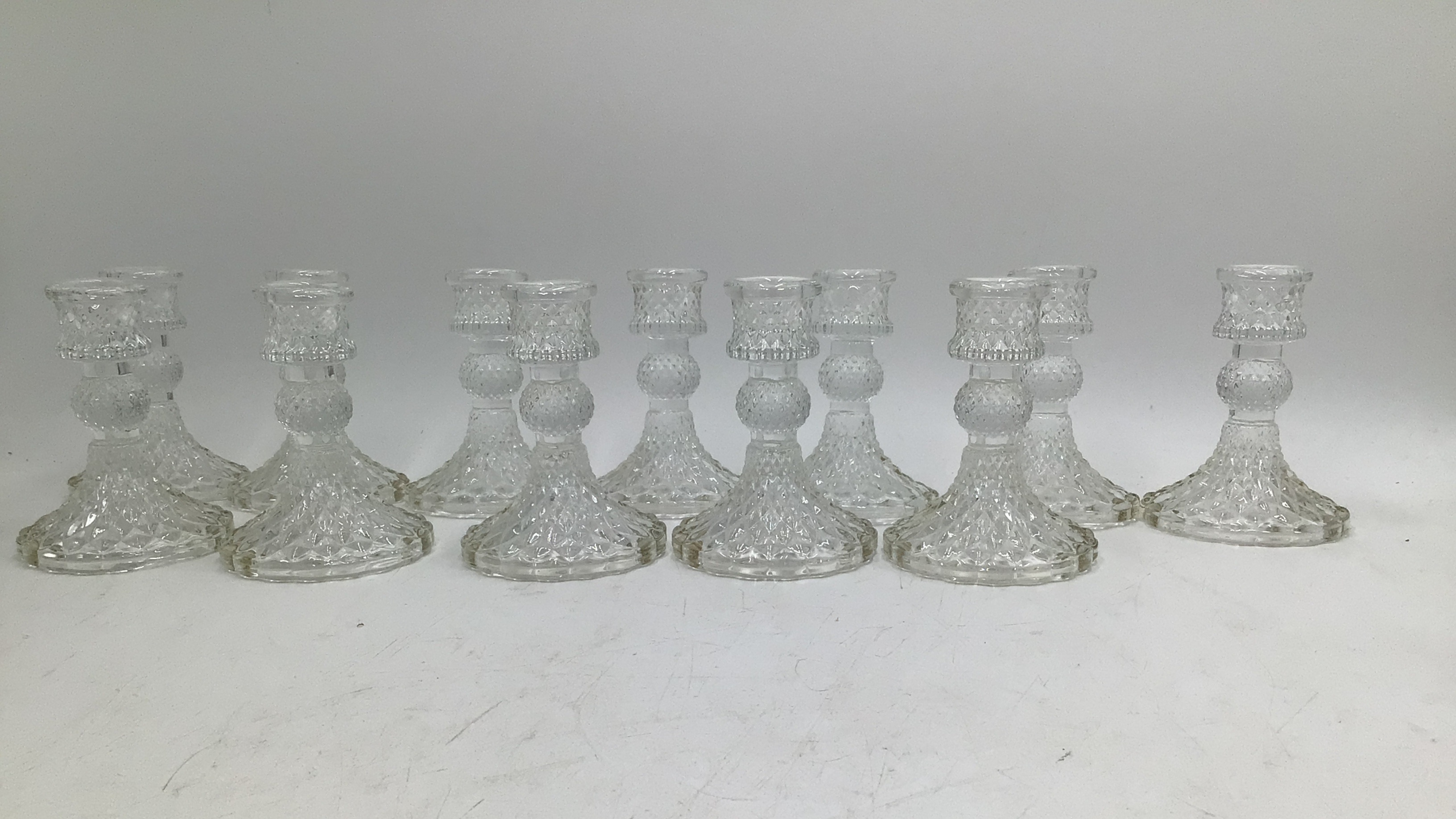 lot 36 image: Vintage Glass Candlestick Holders (Set of Twelve)