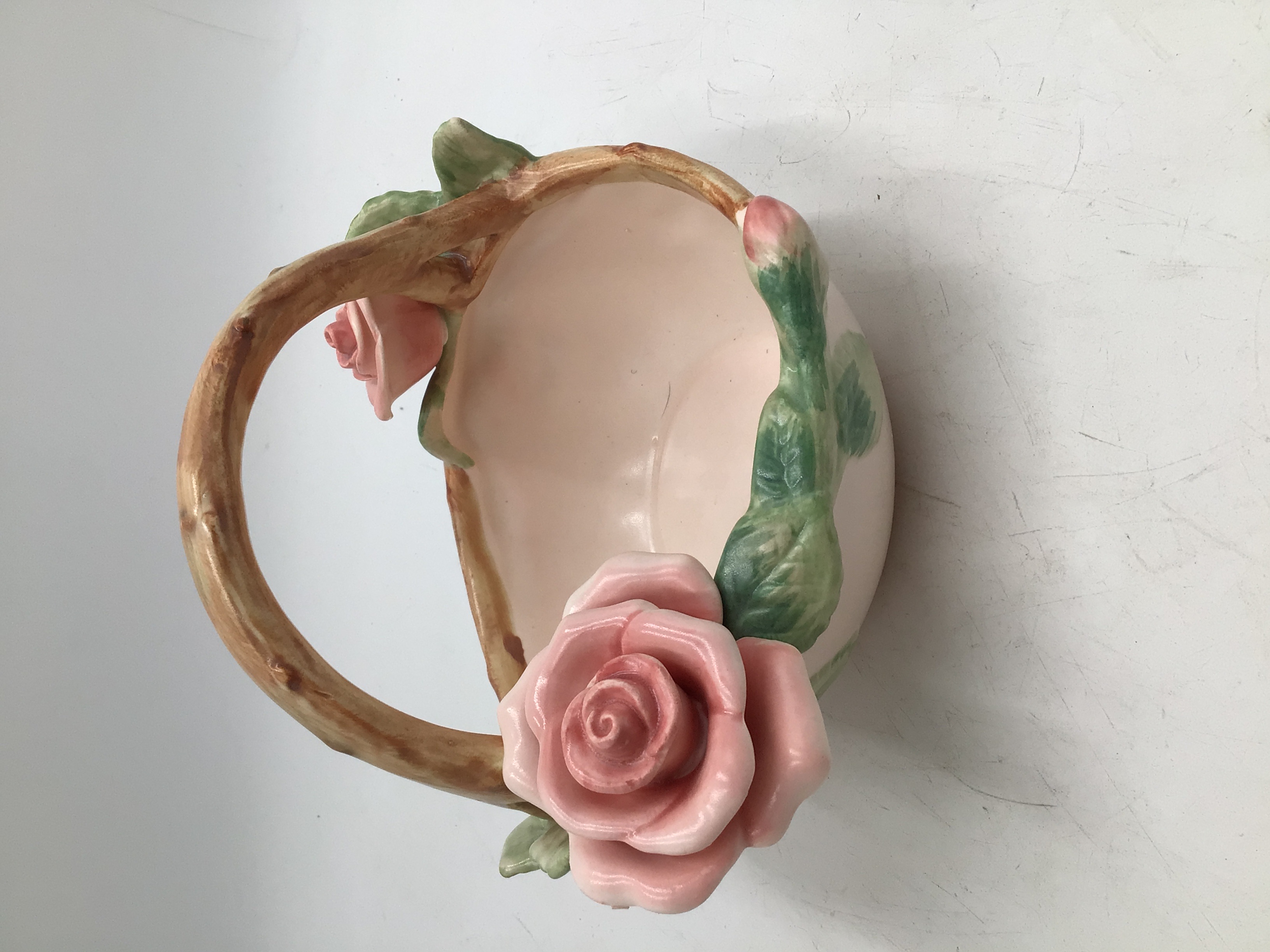 lot 68 image: Vintage ceramic basket with rose accents