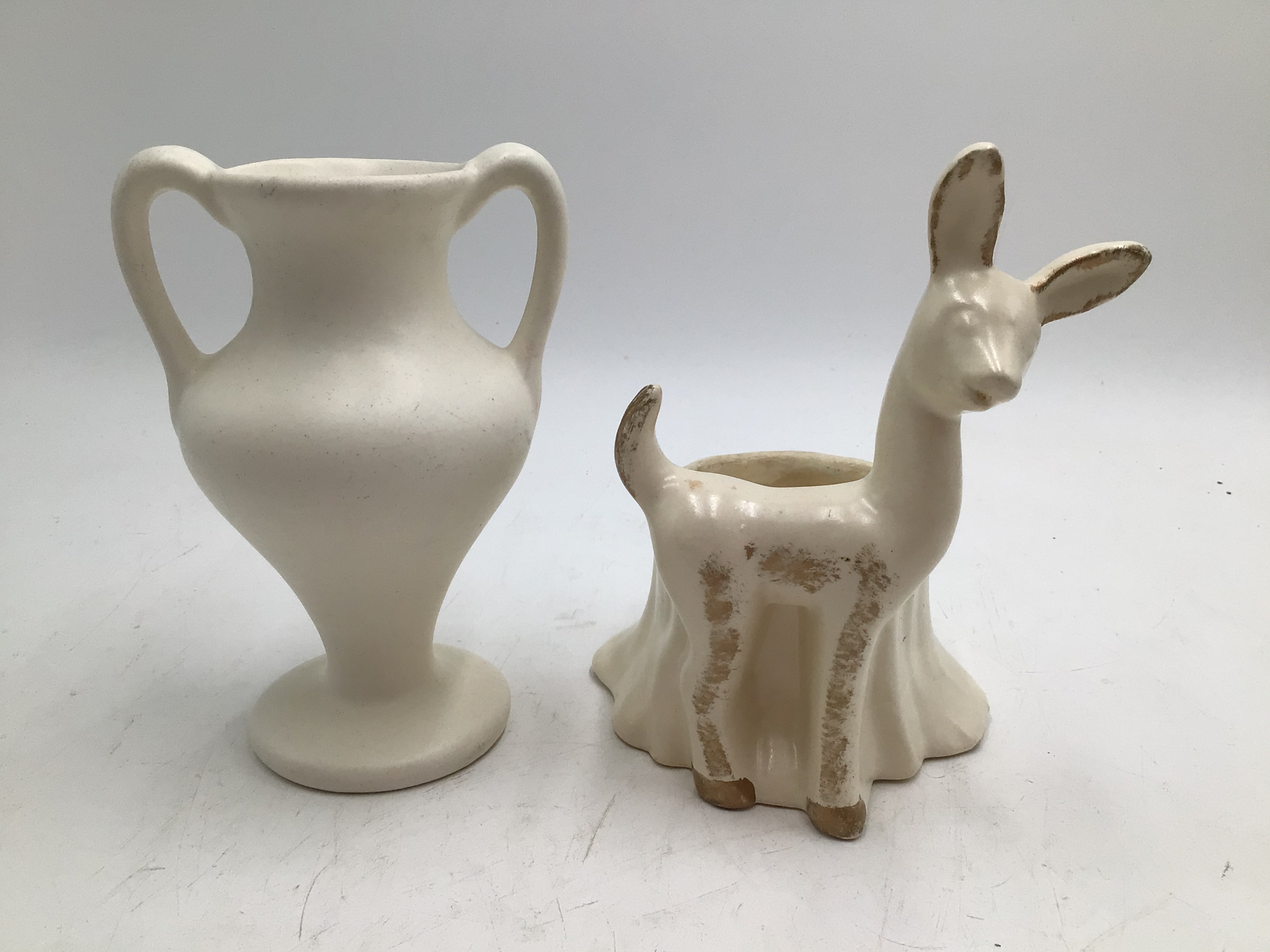 lot 70 image: Vintage Ceramic Pair  White Amphora Vase & Standing Deer Planter  Vase