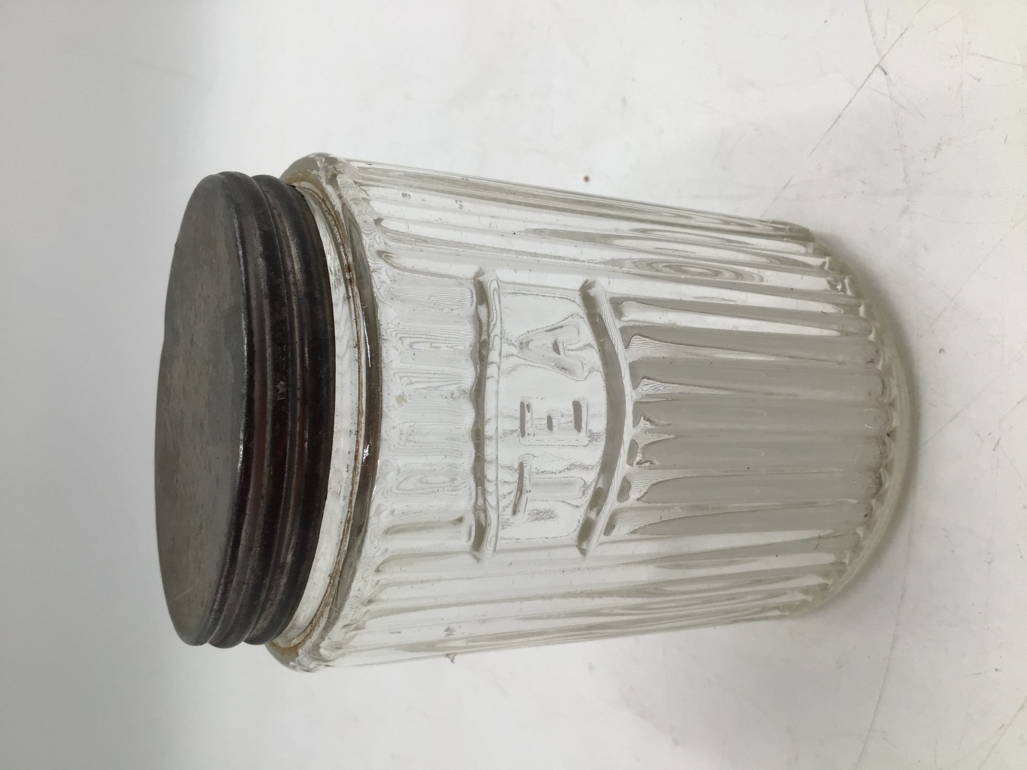lot 95 image: Vintage Embossed Glass Tea Canister  Ribbed Jar with Metal Lid