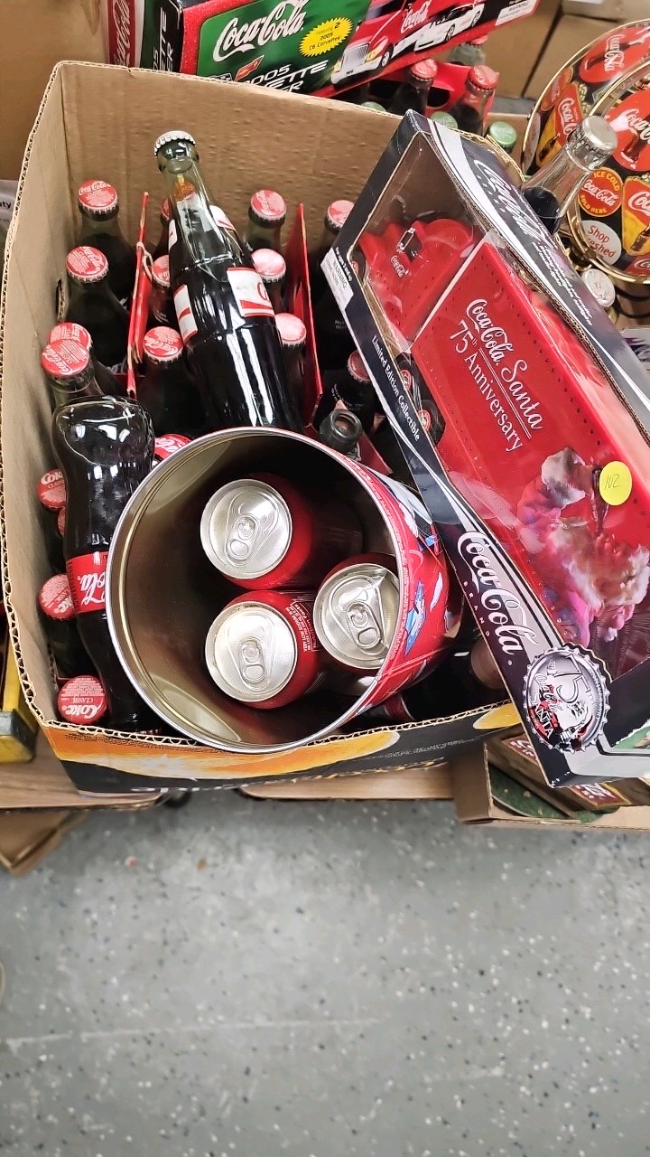lot 102 image: Misc Box of Coke Items, 75th Anniversary Semi and Trailer