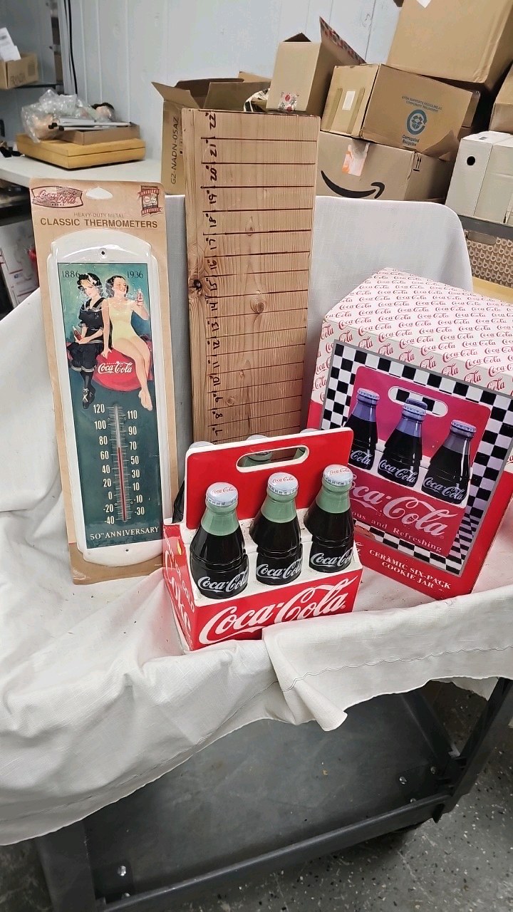 lot 109 image: Coca Cola Thermometer, Cookie Jar and Tins