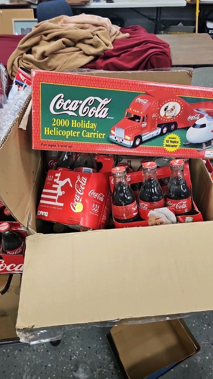 lot 115 image: Coca Cola Vintage Memorbilia and 2000 Holiday Helicopter Carrier