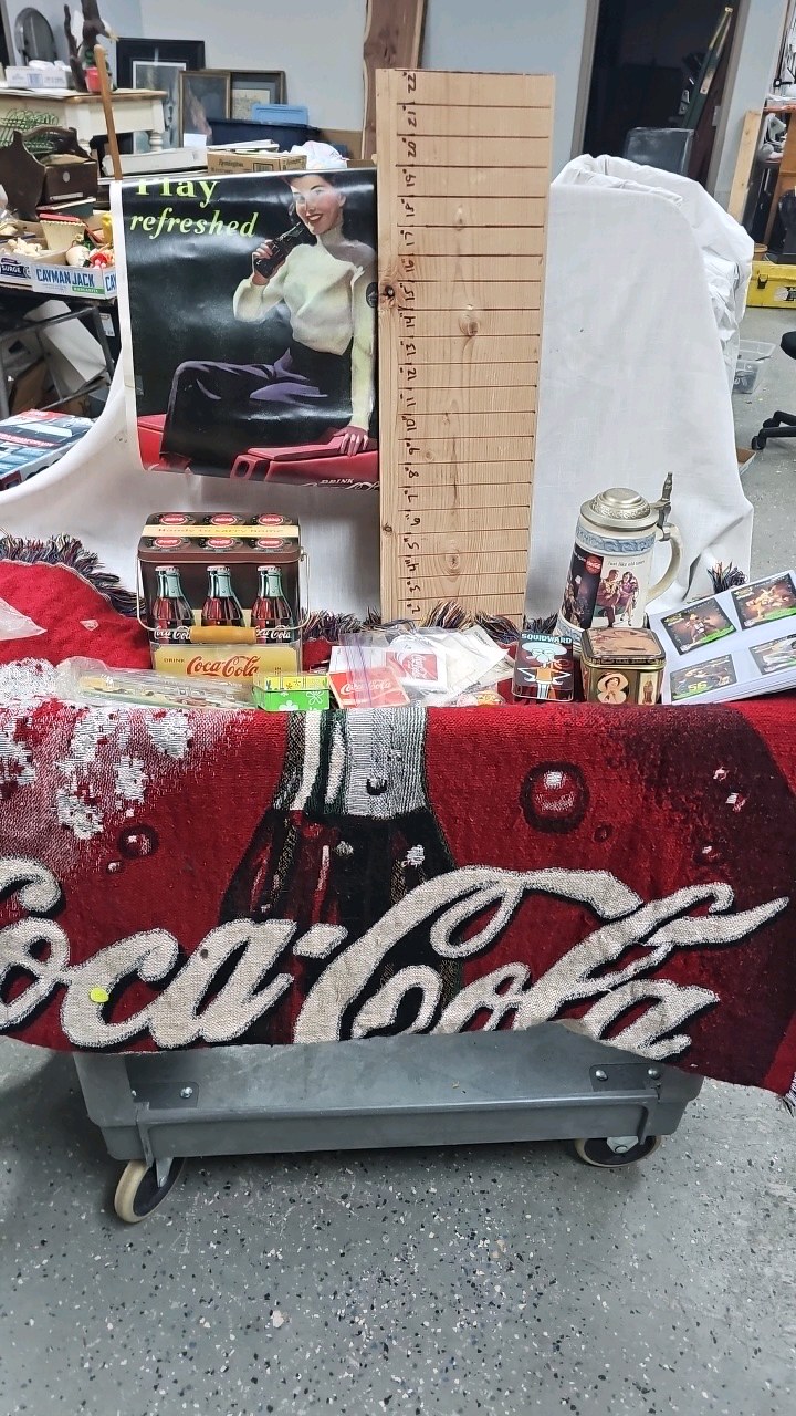 lot 129 image: Coca Cola Throw, Patches, Tins, Case