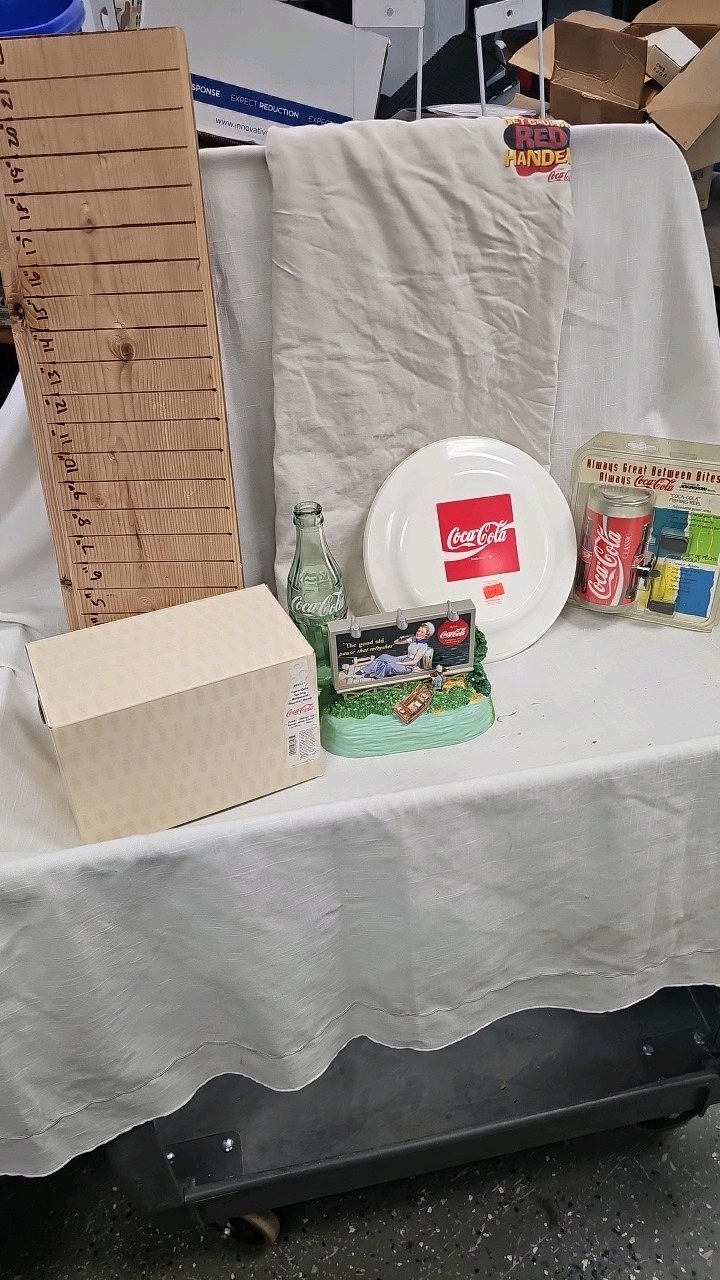 lot 85 image: CC Fishing Reel, Shirt, Frisbee, Musical Bank