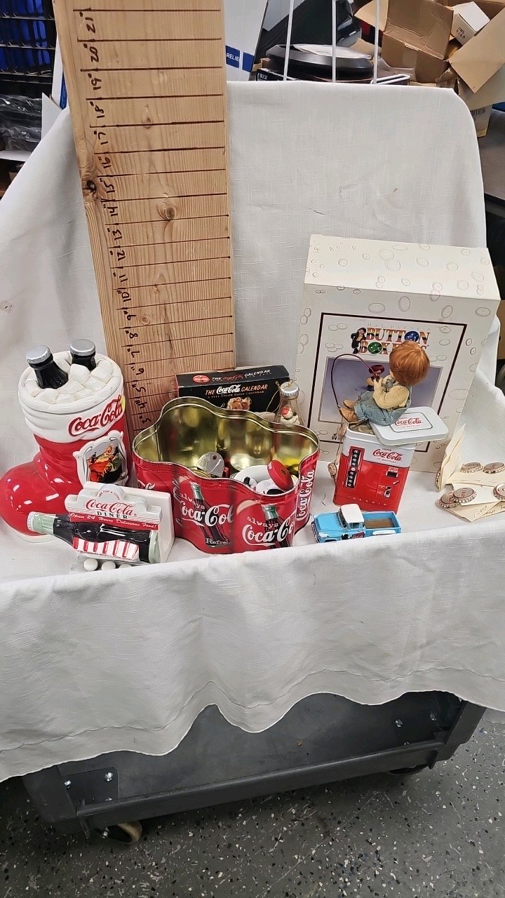 lot 91 image: Coke Sata Figure, Bottles, Stapler