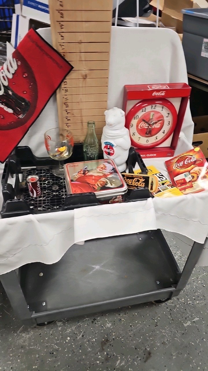 lot 97 image: Coke Clock, Goblet, Tin, and Books