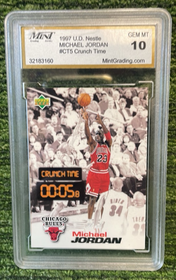 lot 100 image: 1997 Upper Deck Nestl Michael Jordan Crunch Time graded GEM MT 10