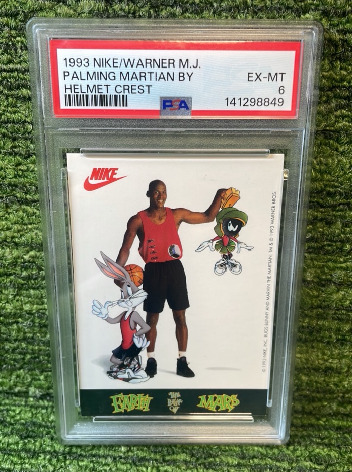 lot 130 image: 1993 NikeWarner Michael Jordan Palming Martian by Helmet Crest, PSA graded EXMT 6
