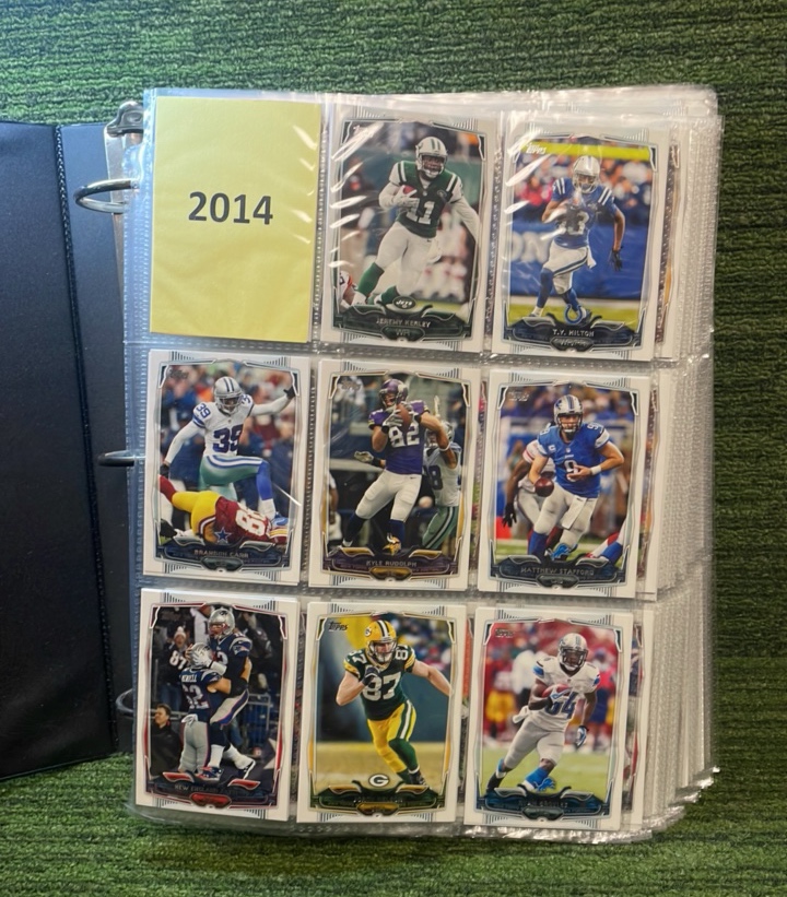 lot 142 image: Topps 2014 and 2015 NFL Sets (#1 434) and (#1-500)