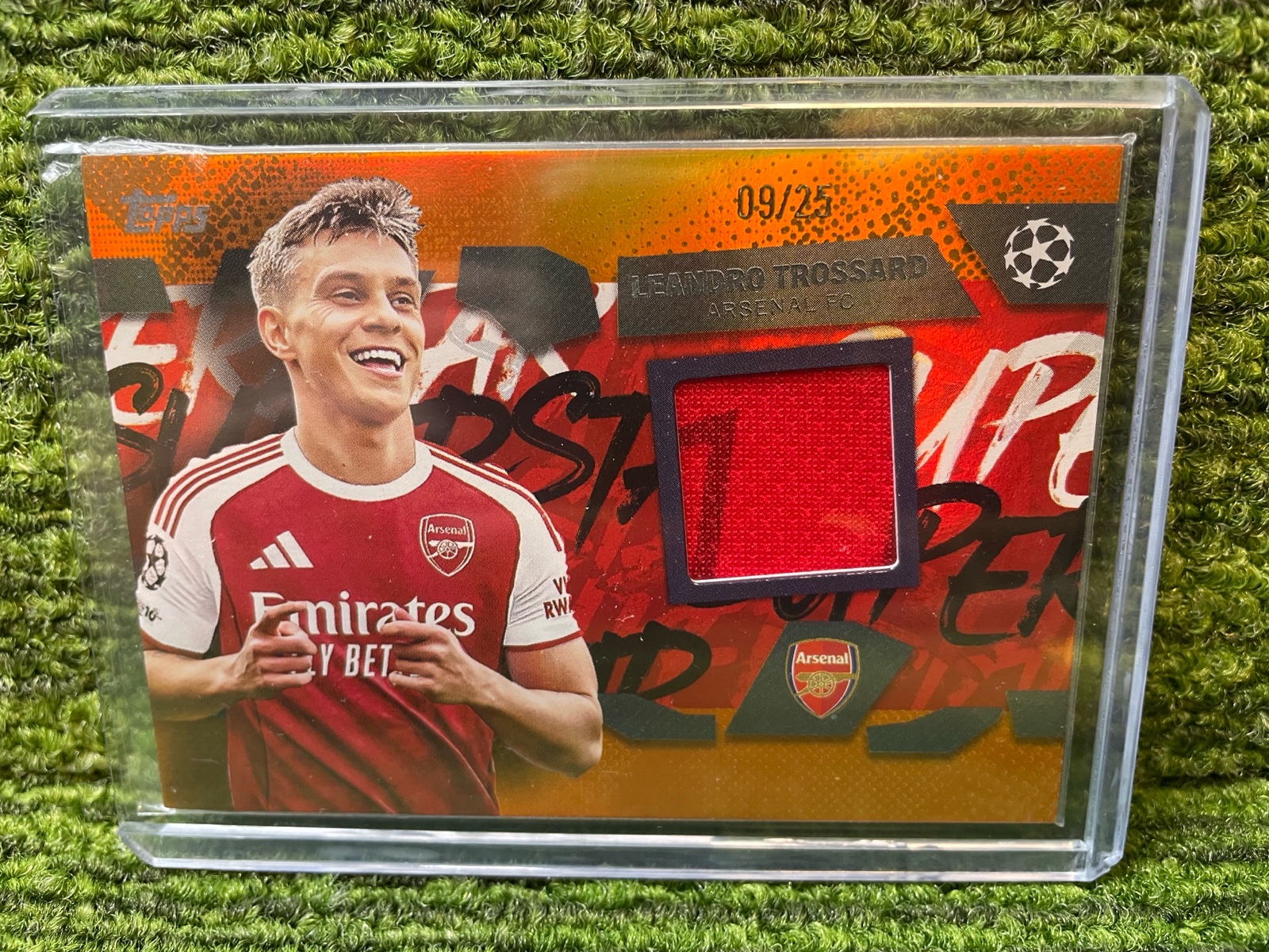 lot 34 image: 202526 Topps Superstar Relic card from UEFA Club Competitions Player Worn LEANDRO TROSSARD Arsenal FC Orange25 Insert