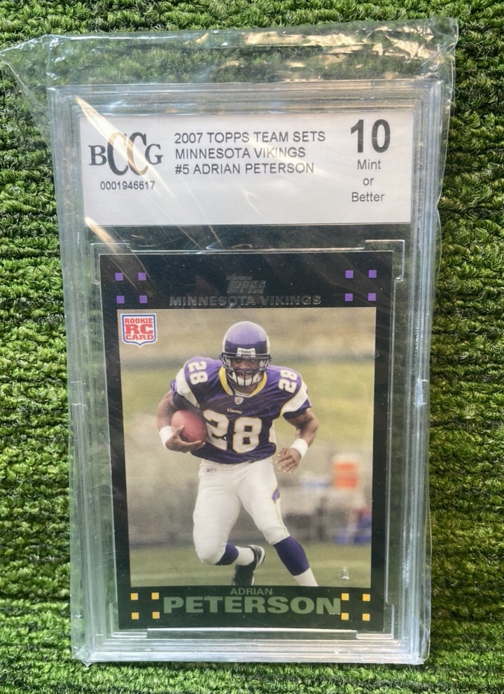 lot 45 image: 2007 Topps Team Sets Adrian Peterson Minnesota Vikings BCCG graded 10 rookie card RC