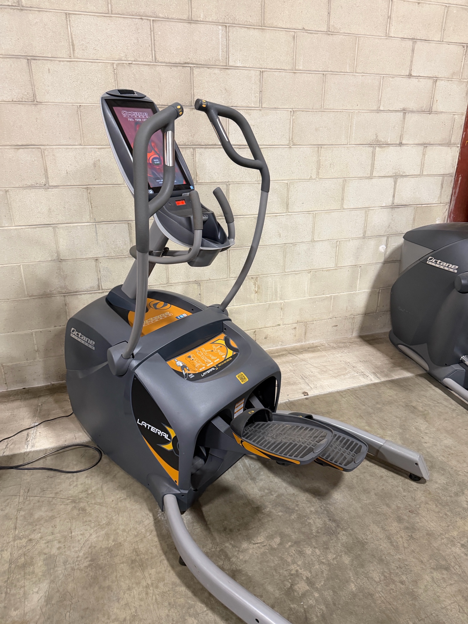 lot 17 image: Octane Fitness LateralX Elliptical Trainer with Touchscreen Console
