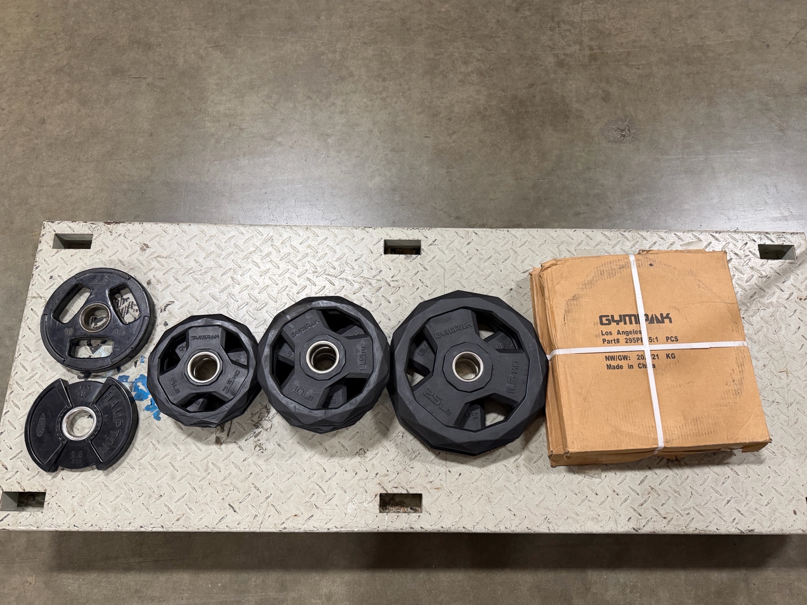 lot 37 image: Olympic Weight Plates - Assorted Set