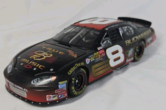 lot 101 image: Dale Earnhardt Jr. Budweiser True Music Monte Carlo  Black Diecast NASCAR Replica