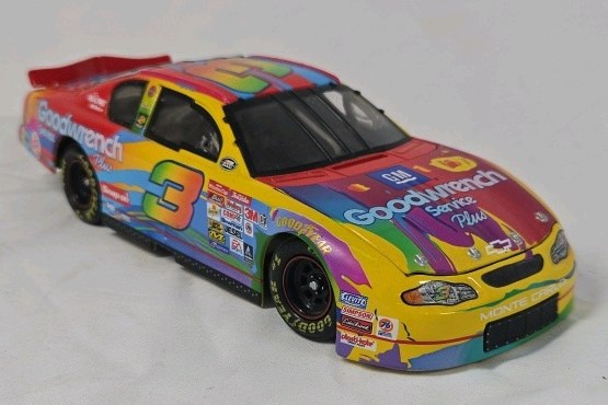 lot 103 image: Dale Earnhardt Sr. 2000 Goodwrench Monte Carlo  Rainbow Flames Diecast NASCAR Replica