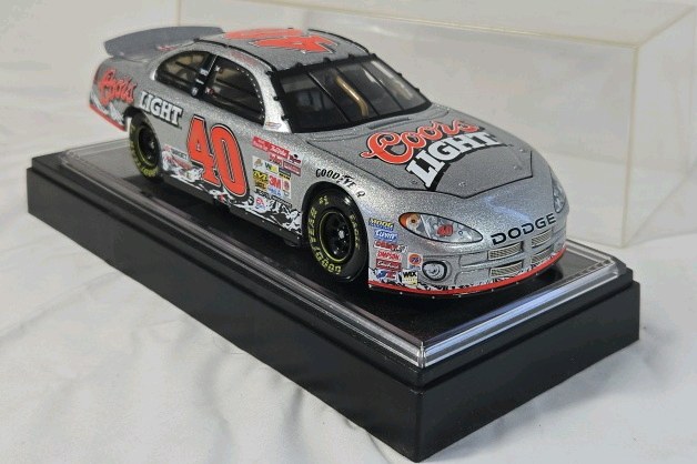 lot 106 image: Sterling Marlin Coors Light Dodge  Silver Metallic Diecast NASCAR Replica with Display Case