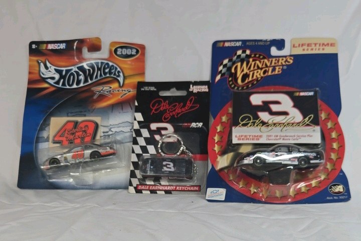 lot 111 image: Assorted Dale Earnhardt and NASCAR Diecast  Hot Wheels, Keychain, and Winners Circle on Blister Cards