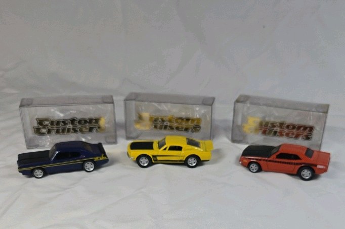 lot 112 image: Vintage Custom Cruisers Diecast Muscle Cars  Set of Three in Original Cases