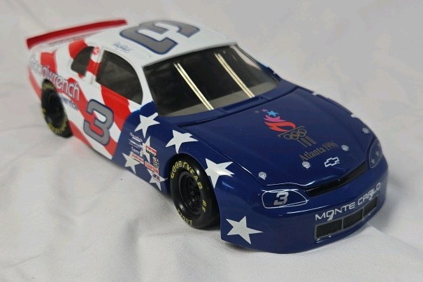 lot 125 image: Dale Earnhardt Sr. Goodwrench Olympics 1996 Monte Carlo  Red White Blue Patriotic Diecast