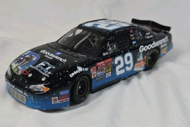 lot 126 image: Dale Earnhardt Sr. Goodwrench ET America Online Monte Carlo  Black Space Theme Diecast