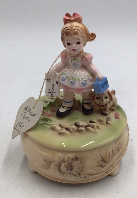 lot 17 image: Vintage Josef Musical Figurine  Girl with Lunchbox and Dog
