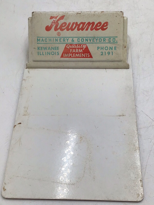lot 182 image: Vintage Kewanee Farm Implements Clipboard  Metal with Advertising Clip