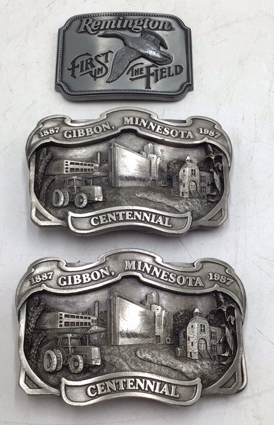 lot 188 image: Vintage Remington First In The Field Canada Goose Belt Buckle  Pair of 1987 Gibbon, MN Centennial Limited Edition Buckles