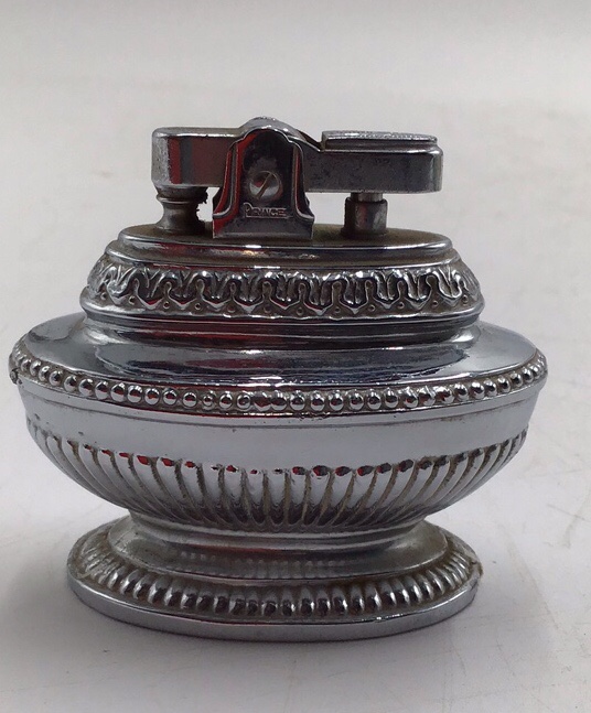 lot 208 image: Vintage Prince Silverplate Table Lighter  Ornate Repousse Design